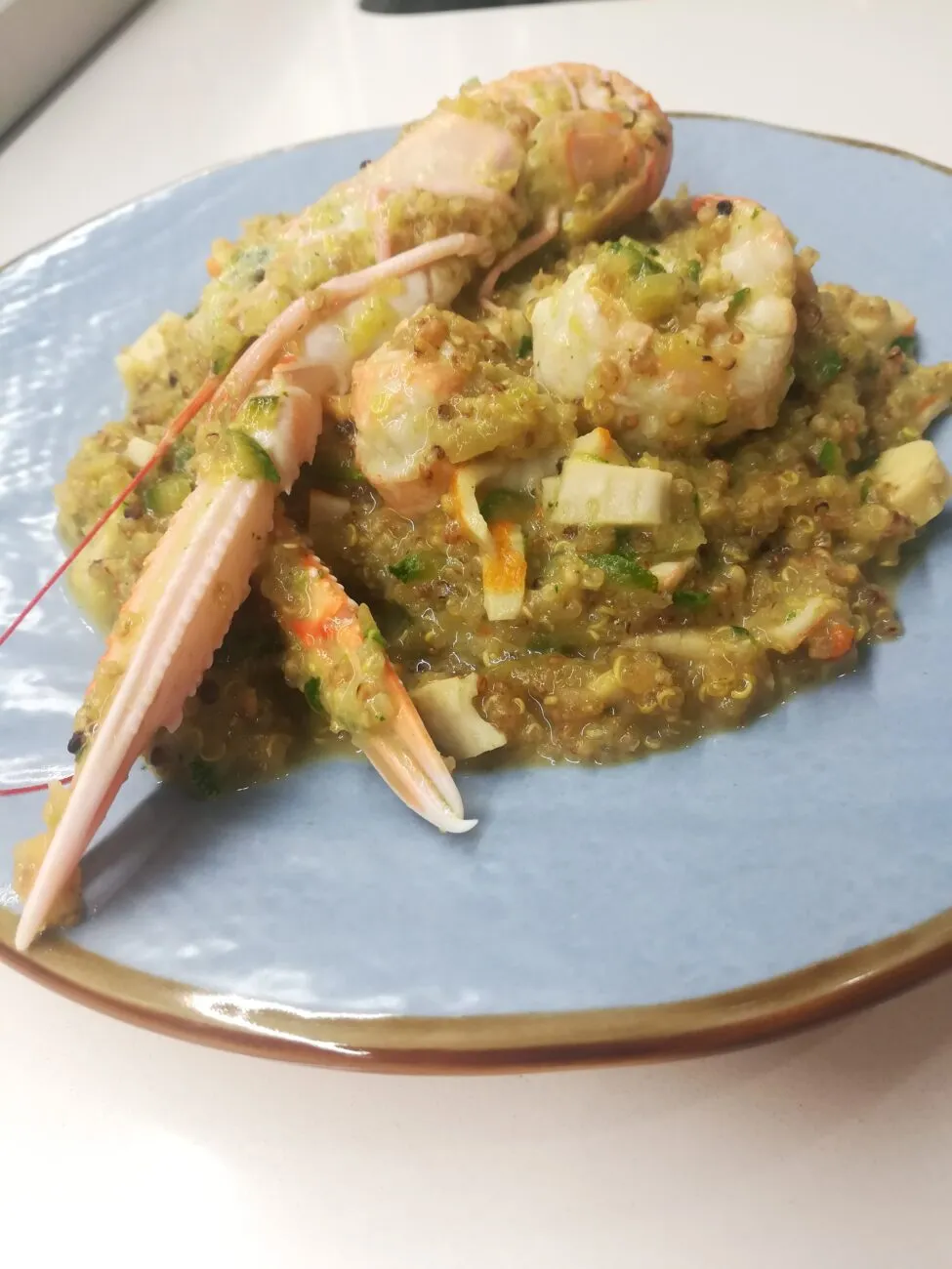 Quinotto scampi, zucchine e curry